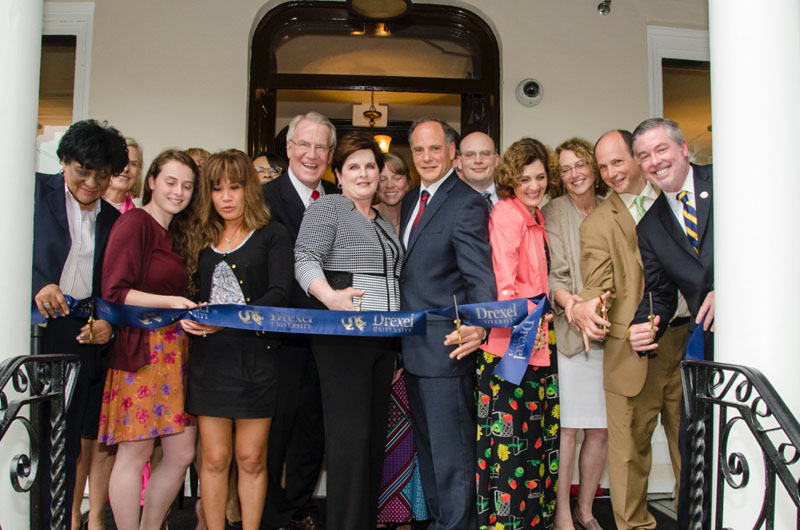 Dana and David Dornsife together with Drexel representatives and the Lindy family cut the ribbon.